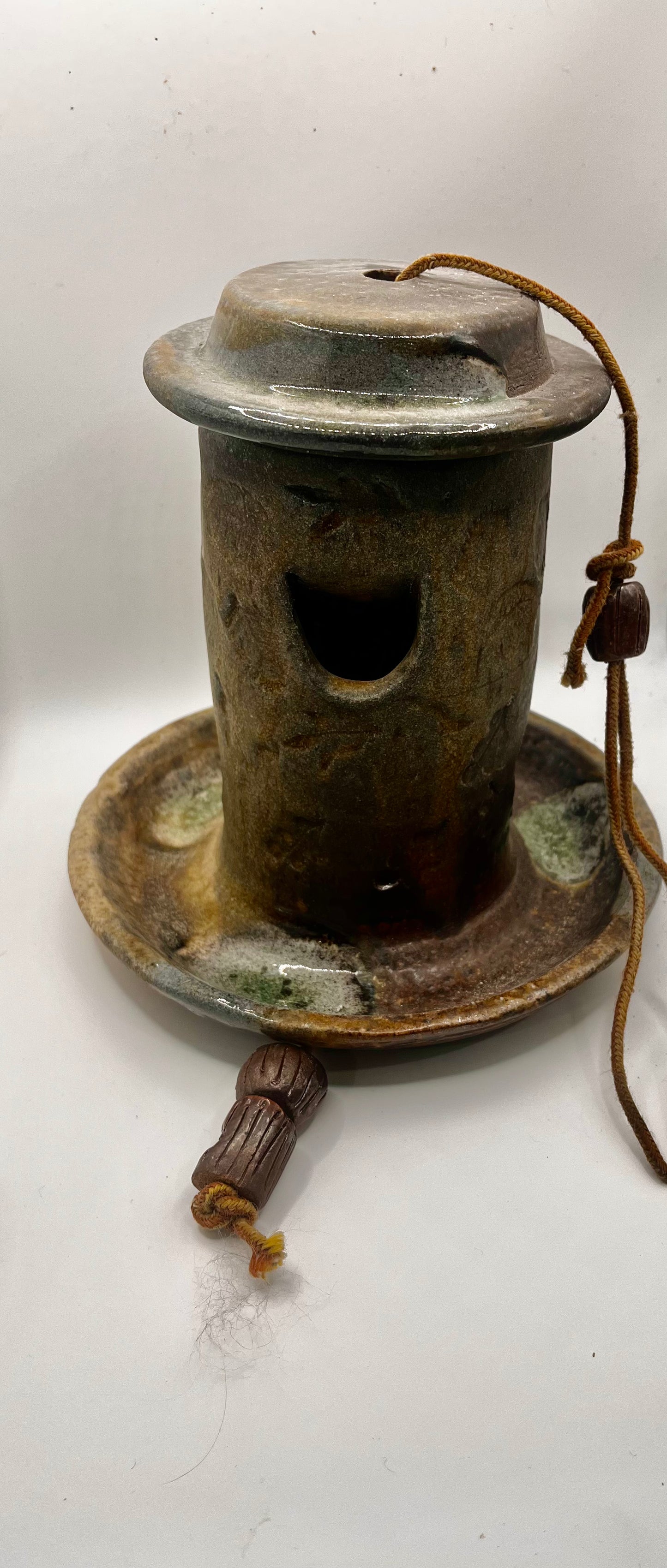 Wood fired bird feeder